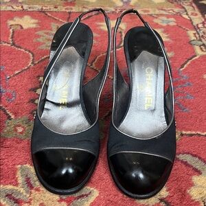 Authentic Chanel round toe sling backs with metallic piping, size 7.